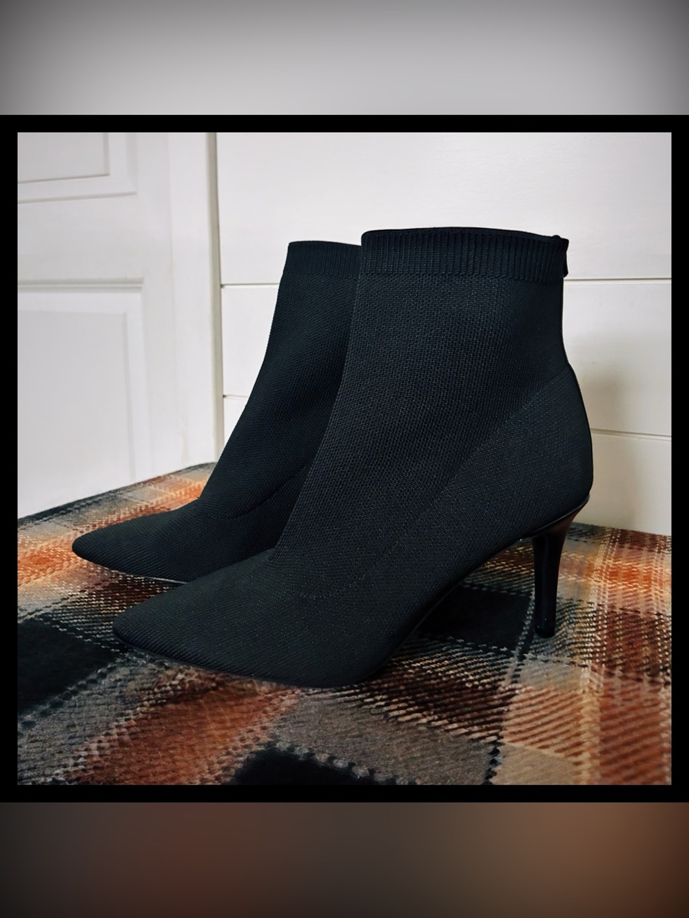 Calvin Klein “Gabby” Black Sock-Knit Stiletto Ankle Boots with Pointed Toe